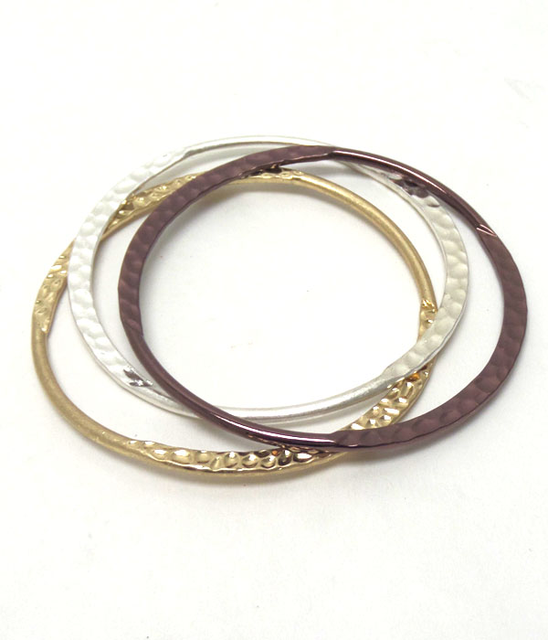 Hammered metal bangle set