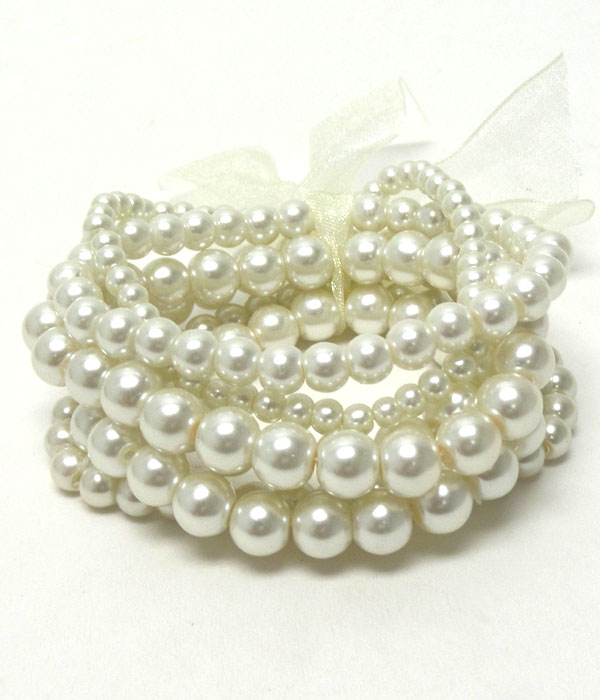 Ribbon tied pearl stretch bracelet