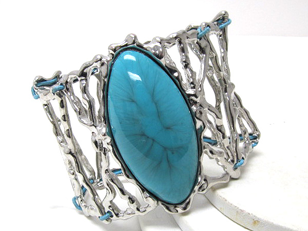 Coral stone on architectural stretch bracelet