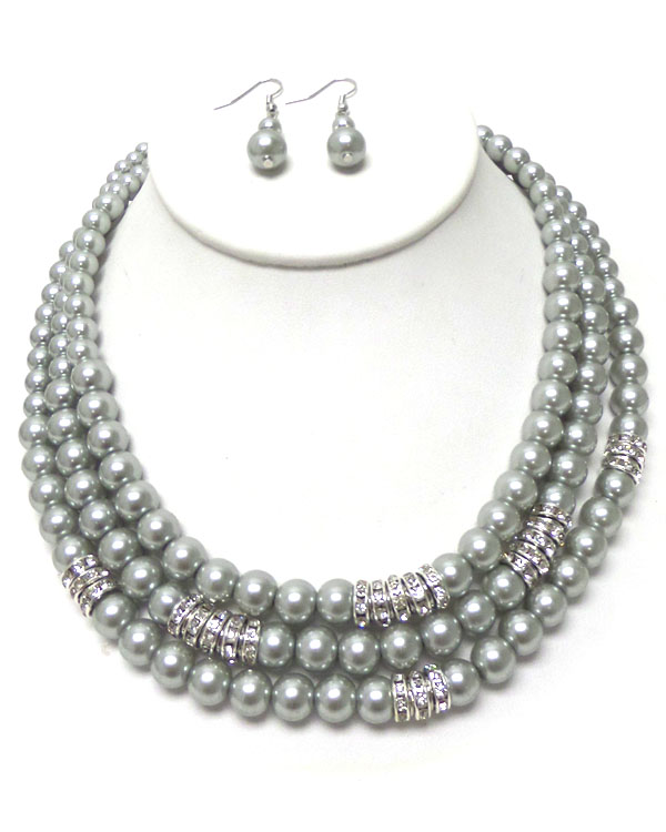 Crystal rondelle and 3 layered pearl necklace earring set