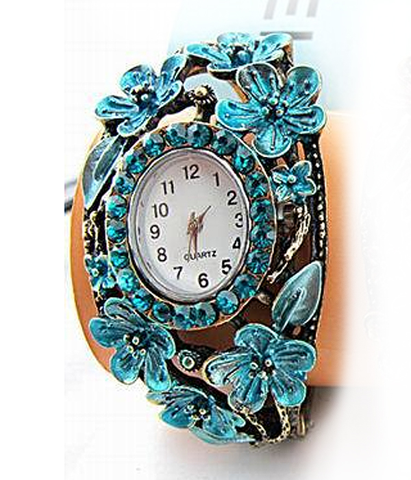 Crystal face and flower bangle watch