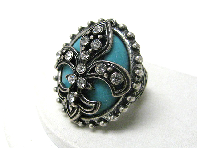 Retro vintage crystal fleur de lis on turquoise stone stretch ring?