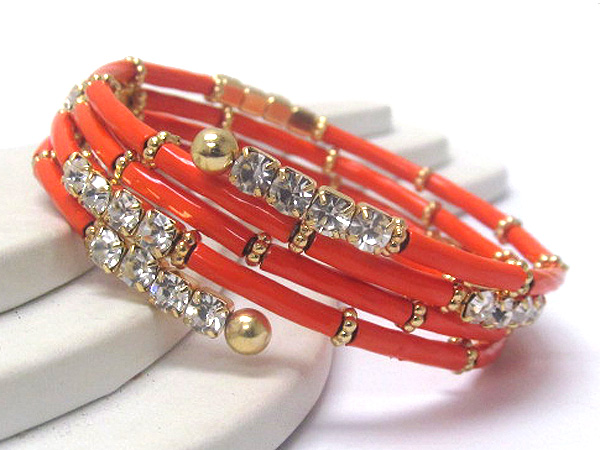 Crystal and metal pipe patern coil bracelet