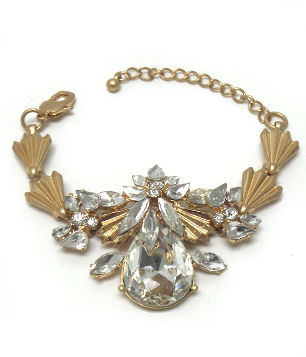 Textured metal with clear stones bracelet