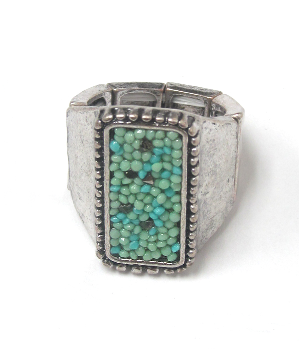 Textured metal with turquoise bead stretch ring