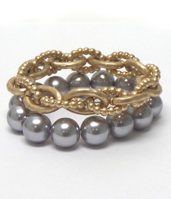 PEARL AND WORN GOLD BRACELET SET 