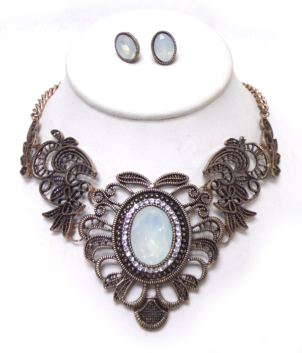 Textured metal with stone center necklace set 