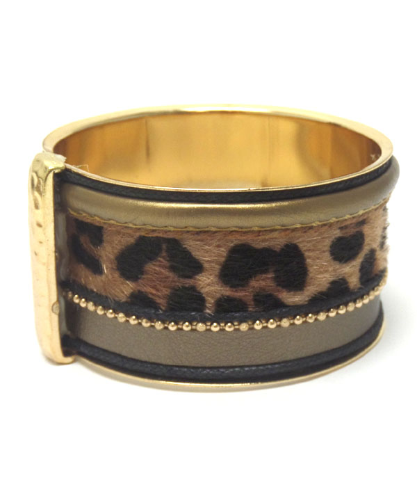 Thick metal and fur bangle