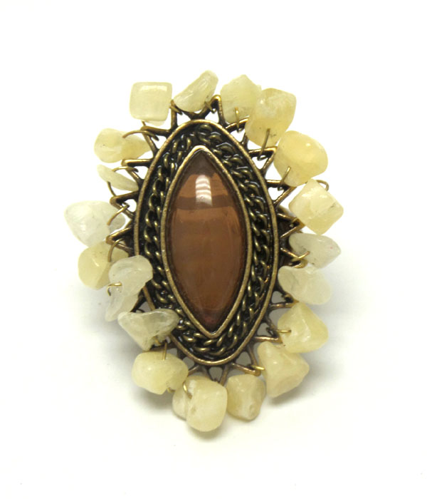 Oval genuine and chip stone border stretch ring