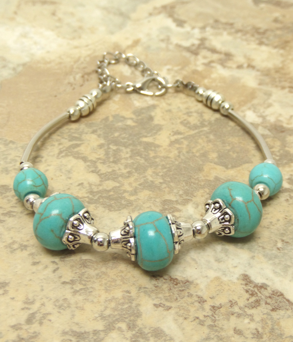 Handmade turquoise and tibetan silver bracelet