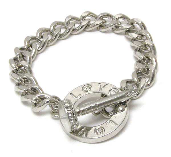 Crystal deco nail and metal ring toggle bracelet