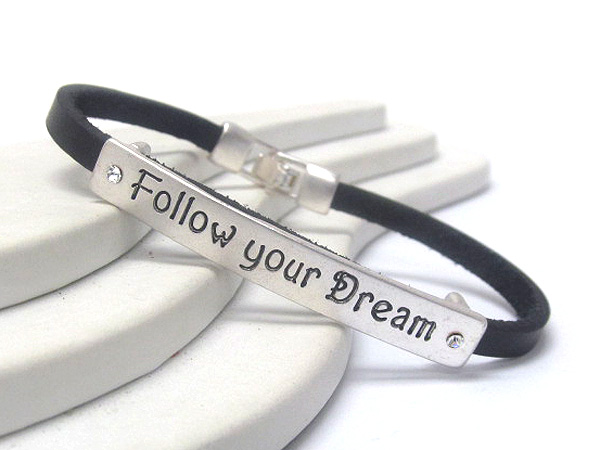 Synthetic leather with crystal on message follow your dream