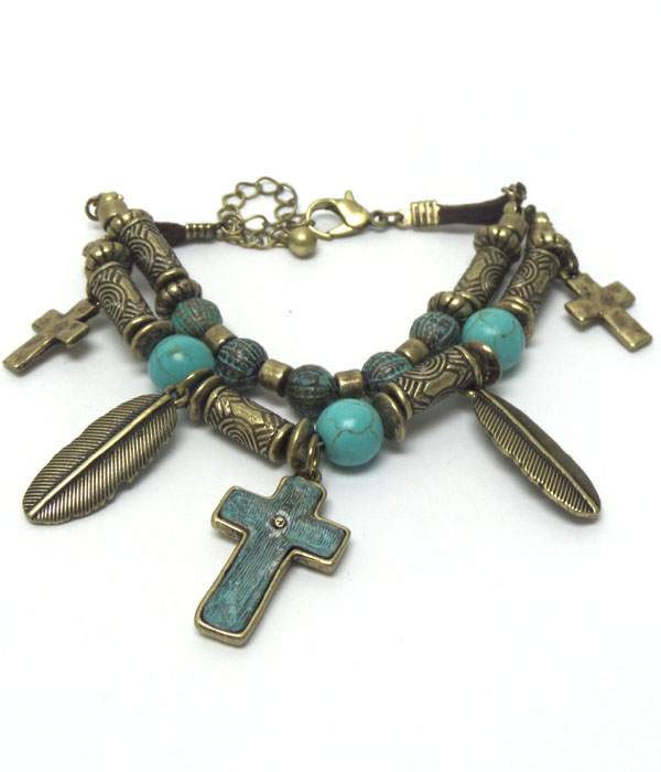 Cross and feather charm bohemian style bracelet