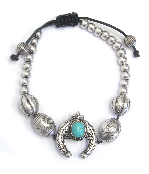 TURQUOISE SQUASH BLOSSOM PULL TIE BRACELET