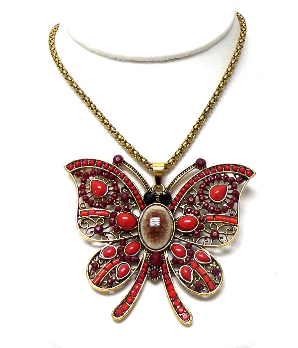 Metal butterfly with stones and beads necklace