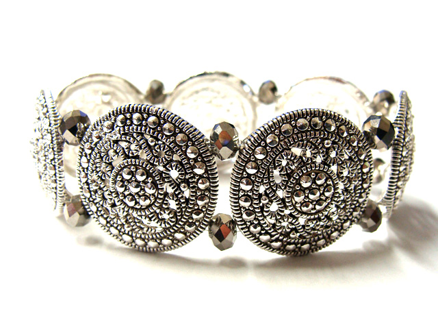 Metal casting and macasite disk link stretch bracelet