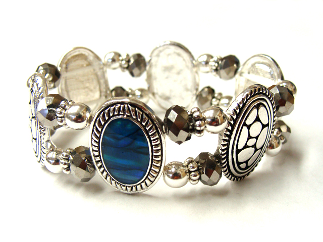 Designer pattern and abalone disk link stretch bracelet