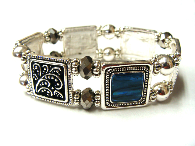 Designer pattern and abalone disk link stretch bracelet