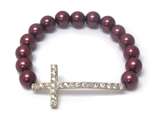 Crystal stud cross and pearl stretch bracelet