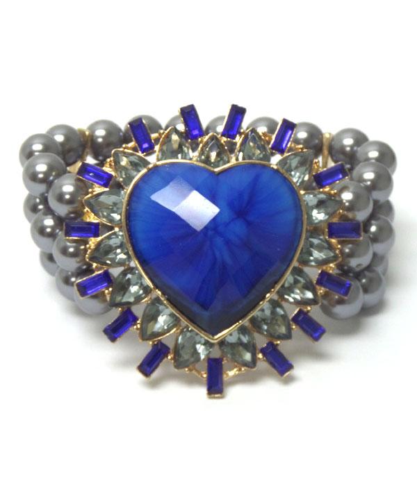 Crystal glass heart with teardrop glass and three row pearl stretch bracelet