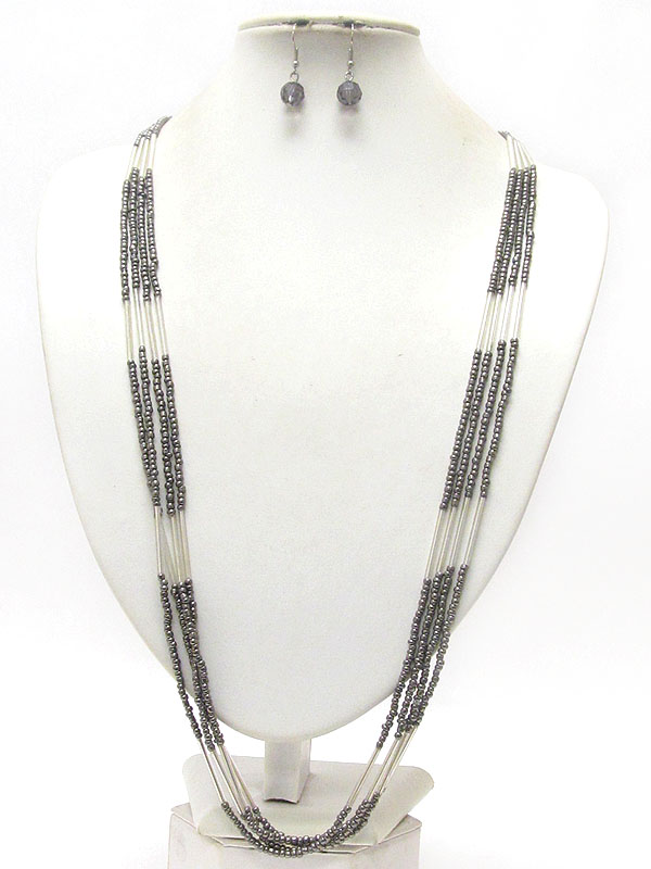 Multi bead and metal tube four layered long necklace earring set