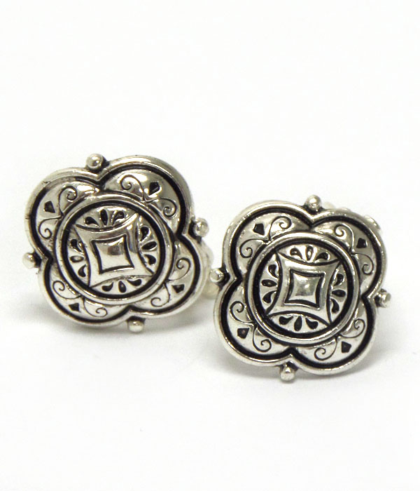 Tailored design textured metal clip on earrings