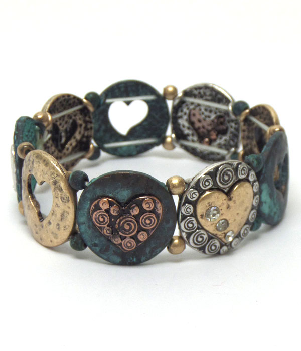 Textured metal disks with heart bracelet