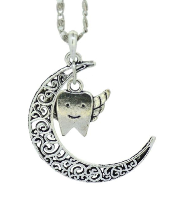 Metal filigree moon and tooth fairy pendant necklace