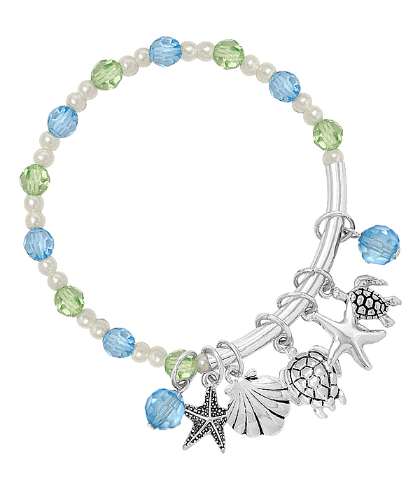 SEALIFE THEME MULTI CHARM STRETCH BRACELET - TURTLE STARFISH SHELL