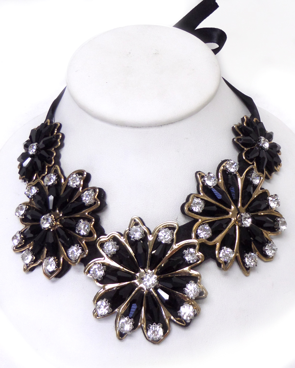 Linked flowers with crystals bow tie back bib necklace set