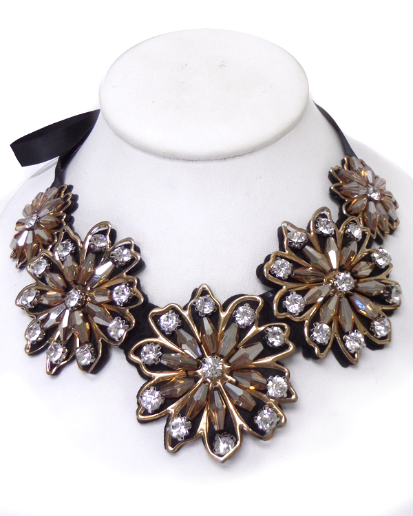 Linked flowers with crystals bow tie back bib necklace set