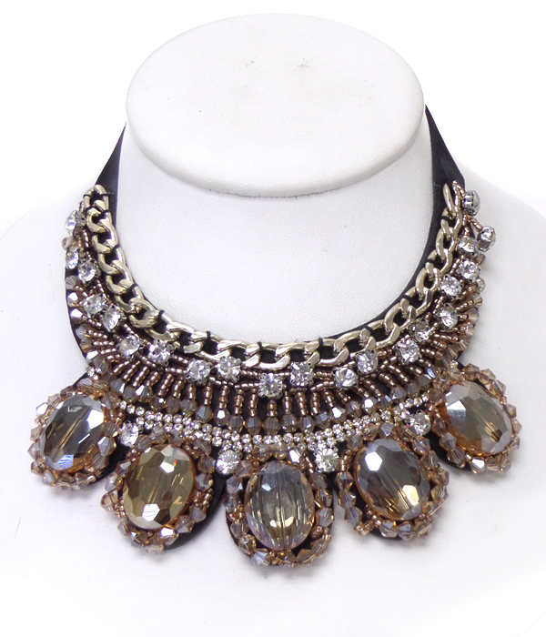 Multi layer metal chain and crystal designs bow tie back bib necklace