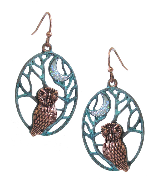 Metal filigree owl earring