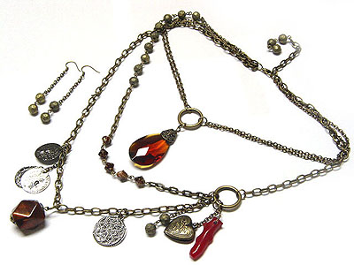 Triple level chain facet tear drop and multi charm drop necklace and earring set