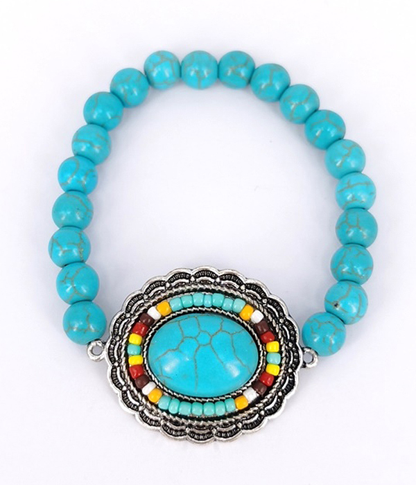 TURQUOISE CENTER AND MULTI BALL BEAD STRETCH BRACELET