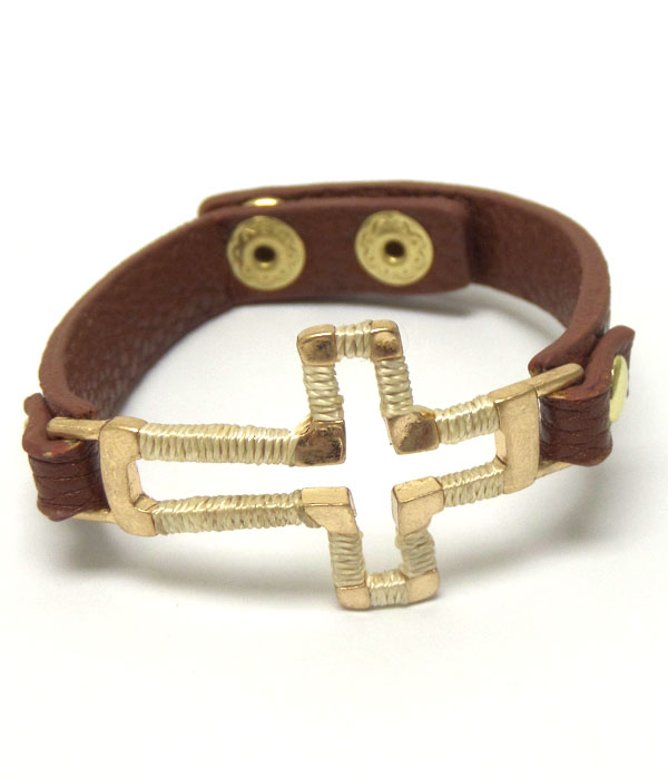 Metal cross with leather band button bracelet