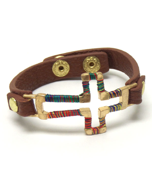 Metal cross with leather band button bracelet