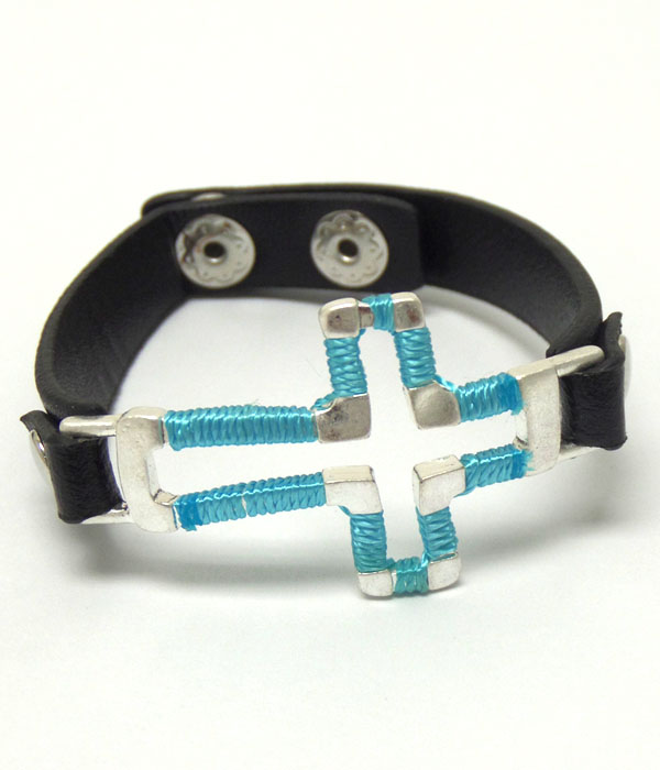 Metal cross with leather band button bracelet