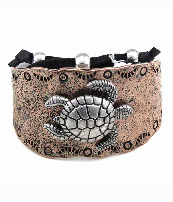 Metal textured with turtle pull and tie bracelet