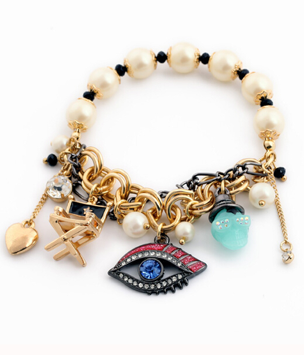 Boutique style crystal eye and mixed charm pearl stretch bracelet