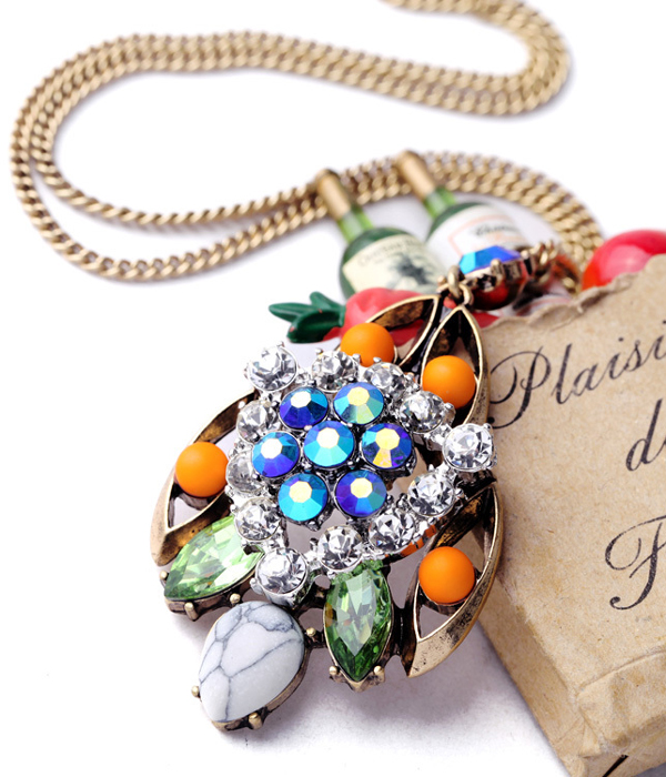 Boutique style crystal and mixed stone bouquet pendant long necklace