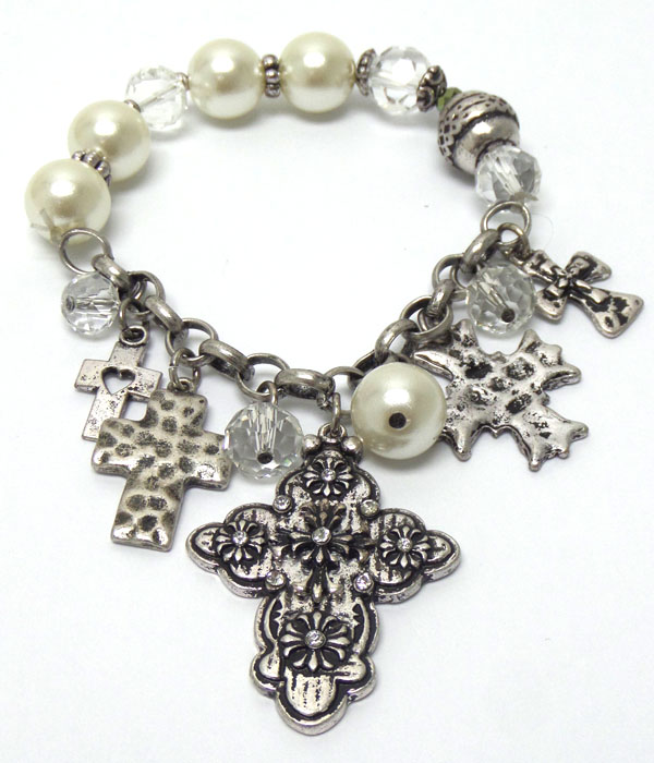 Vintage look multi textured cross charm and pearl chain stretch bracelet