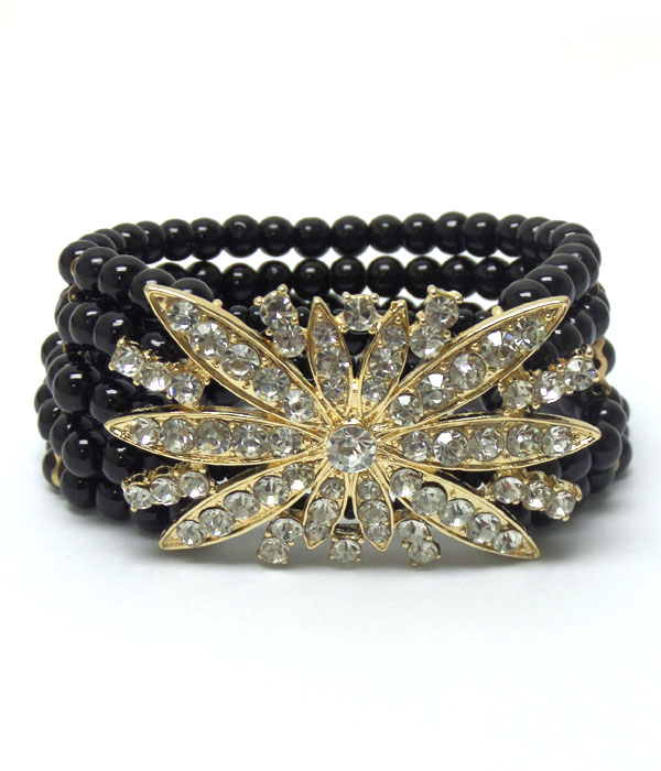 Five row pearl with flower bracelet