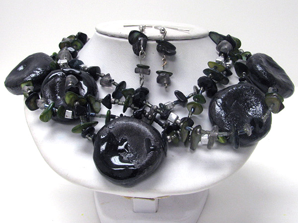 Multi figurine disk and chip stone necklace earring set