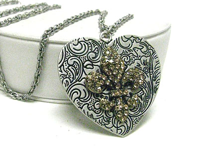 Crystal fleur de lis on filigree metal heart pendant long neckalce
