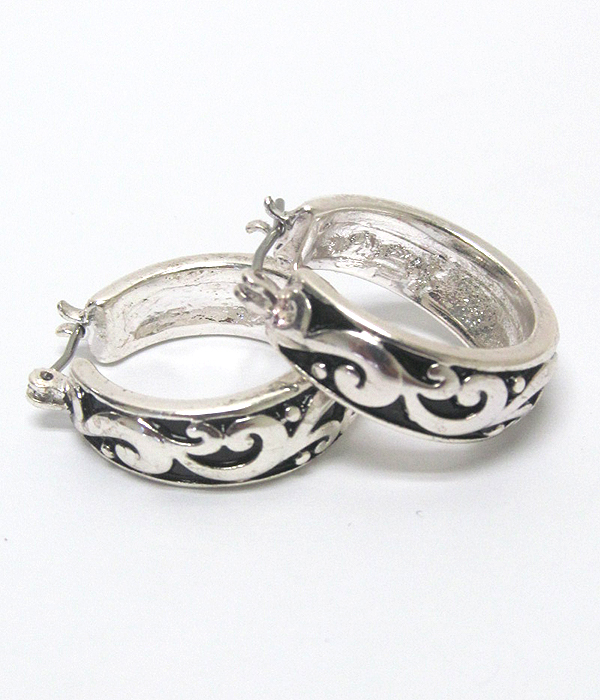 Filigree metal hoop earring