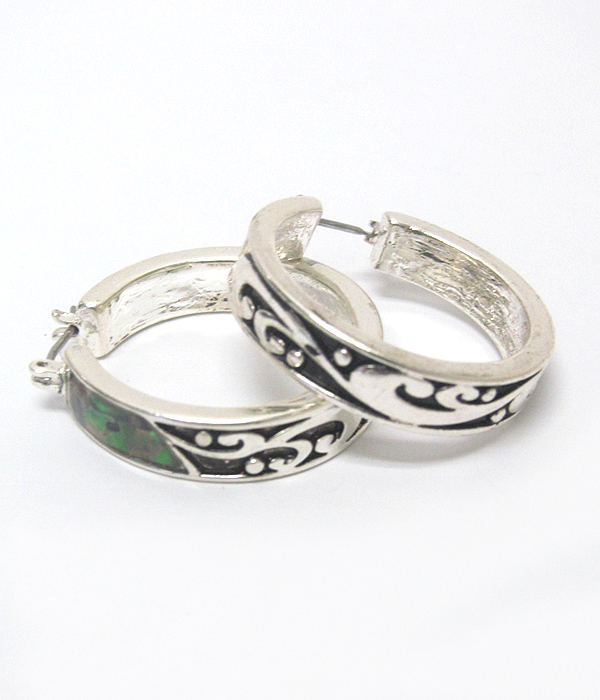 Filigree metal hoop earring