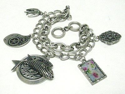 Antique style multi charm toggle bracelet