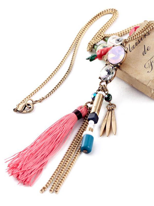 Boutique style tassel and multi charm long necklace
