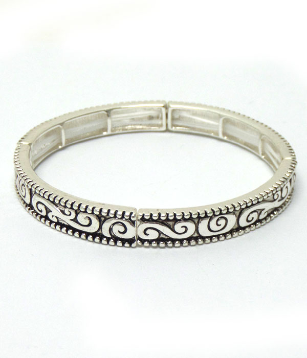 Textured metal with design bracelet
